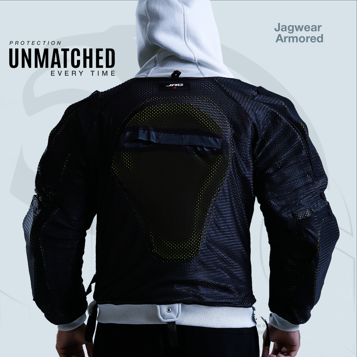 Black armored jacket with visible branding on a light gray background